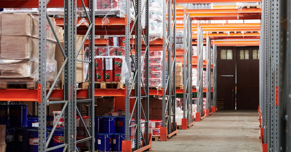 Industrial warehouse interior with organized shelves stacked with packages and goods.